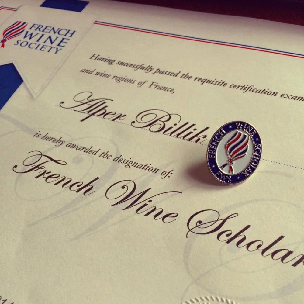 Alper Billik's French Wine Scholar certificate with the French Wine Scholar pin